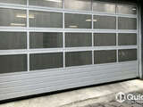 4Ddoors Industrial Sectional Door - APU Expanded Mesh and S-Ribbed Bottom Panel
